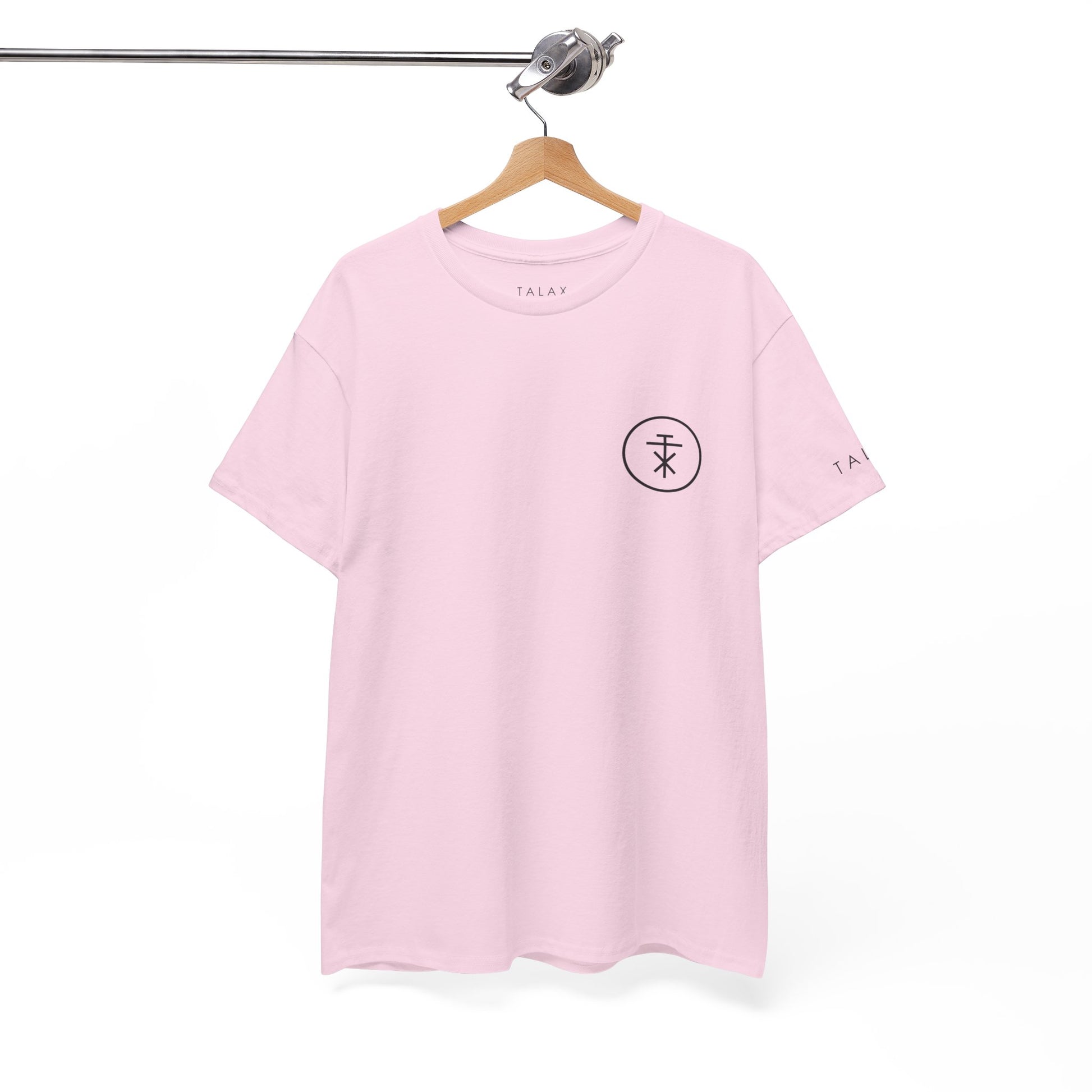 TALAX pink tee hanging on wooden hanger, front view